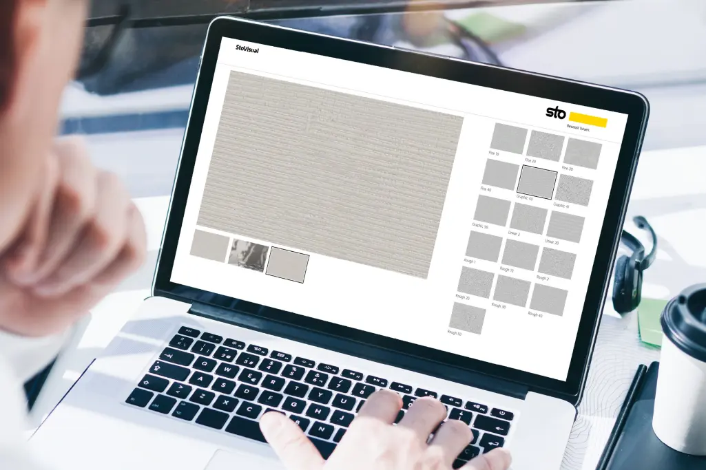 Bilde av en pc/mac med Stovisual oppe på skjermen